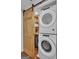 Convenient laundry area featuring stacked washer and dryer at 11 Frances Turn, Sharpsburg, GA 30277