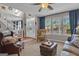Inviting living room area with natural light, hardwood floors, and a view of the front porch at 11 Frances Turn, Sharpsburg, GA 30277