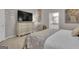 Comfortable main bedroom with ensuite bathroom and large dresser at 11 Frances Turn, Sharpsburg, GA 30277