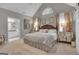 Spacious main bedroom with vaulted ceiling and ensuite bathroom at 11 Frances Turn, Sharpsburg, GA 30277