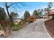 Mature landscaping with custom patio at 5141 Dixie Lake Rd, Union City, GA 30291