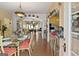 Spacious dining room with hardwood floors and lots of natural light and decorative archways at 5141 Dixie Lake Rd, Union City, GA 30291