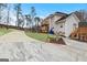 Rear exterior featuring a spacious back yard with custom deck at 5141 Dixie Lake Rd, Union City, GA 30291