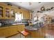 Kitchen with granite countertops, custom cabinets, updated appliances, and decorative accents at 5141 Dixie Lake Rd, Union City, GA 30291