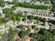 Aerial view of a home in a well-established neighborhood surrounded by mature trees and lush landscapes at 140 Pecan Ridge Dr, Fayetteville, GA 30215