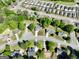 This is an aerial view of the property, showcasing a well-maintained neighborhood with lush greenery at 140 Pecan Ridge Dr, Fayetteville, GA 30215