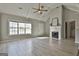 Bright and airy living room with fireplace, vaulted ceilings, and modern flooring at 140 Pecan Ridge Dr, Fayetteville, GA 30215