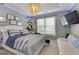 Bedroom featuring a decorative chandelier, light green walls and white furniture at 102 Santolina Park, Peachtree City, GA 30269