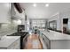 Spacious kitchen with a large island, modern appliances, and a breakfast nook with ample natural light at 102 Santolina Park, Peachtree City, GA 30269