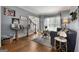 Bright living room with hardwood floors, classic decor, and inviting layout at 102 Santolina Park, Peachtree City, GA 30269