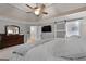 Relaxing primary bedroom with barn door access to a closet or bathroom at 102 Santolina Park, Peachtree City, GA 30269