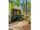 An outdoor screened-in porch area featuring an outdoor lounge area at 102 Santolina Park, Peachtree City, GA 30269