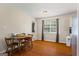 Cozy dining area next to kitchen with hardwood floors and natural light at 195 Riverbend Dr, Covington, GA 30014