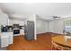 Open kitchen and living area featuring modern appliances and ample counter space at 195 Riverbend Dr, Covington, GA 30014