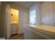 Convenient laundry area with a washer, dryer, and storage space, providing functionality and organization at 6806 Blackstone Pl # 12, Mableton, GA 30126