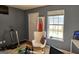 Inviting living room with chair, window and plenty of natural light at 6806 Blackstone Pl # 12, Mableton, GA 30126