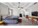 Large main bedroom featuring a tray ceiling, ceiling fan, neutral decor, and carpeted flooring at 750 Gates Ln, Alpharetta, GA 30022