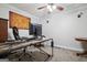 Home office with a large desk, rolling chair, and decoratively hung map on the wall at 750 Gates Ln, Alpharetta, GA 30022