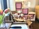 Bedroom decor includes a miniature piano with toys, and pink plastic storage bins at 727 Channing Dr, Atlanta, GA 30318