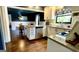 Stylish kitchen features white cabinetry, stainless steel appliances, and granite countertops at 727 Channing Dr, Atlanta, GA 30318