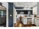 Open kitchen with stainless steel appliances, granite countertops, and hardwood floors at 727 Channing Dr, Atlanta, GA 30318
