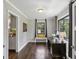 Well-lit office with a desk, bench, and windows offering a view of the outdoors at 727 Channing Dr, Atlanta, GA 30318
