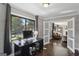 Bright office with a large window, a desk, and hardwood floors, offering an open feel at 727 Channing Dr, Atlanta, GA 30318