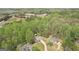 Nestled in lush greenery, this charming home offers privacy with an easy access to nearby commercial areas at 6435 Philips Creek Dr, Cumming, GA 30041
