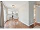 Bright and airy kitchen with stainless steel appliances and center island enhances a spacious open floorplan at 6435 Philips Creek Dr, Cumming, GA 30041