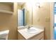 Bathroom with a white vanity, mirror, sink, and toilet creating a clean and functional space at 6844 Saganaw Dr, Rex, GA 30273