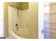 Classic bathroom with a tub and shower and convenient storage shelves providing ample space at 6844 Saganaw Dr, Rex, GA 30273