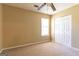 Bright bedroom with a window and spacious closet offering comfort and ample storage at 6844 Saganaw Dr, Rex, GA 30273