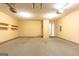 Spacious two car garage, with shelves and lights at 6844 Saganaw Dr, Rex, GA 30273