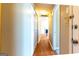 Hallway with hardwood floors and access to the other rooms in the house at 6844 Saganaw Dr, Rex, GA 30273