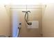 Empty laundry room hookups and open shelf for storage at 6844 Saganaw Dr, Rex, GA 30273