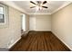 Spacious living area features updated floors, a ceiling fan, and freshly painted neutral walls at 1089 Canal St, Decatur, GA 30032