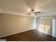 Bright living space featuring wood-look floors, recessed lighting, and sliding glass doors at 1089 Canal St, Decatur, GA 30032