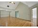 Open floor plan showing living room with vaulted ceiling and hardwood floors at 322 Wood Rdg, Peachtree City, GA 30269
