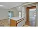 Open concept shows living room, hardwood floors, and access to multiple living spaces at 322 Wood Rdg, Peachtree City, GA 30269