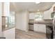 Well-equipped kitchen featuring stainless steel appliances, granite countertops, and ample cabinet space at 7161 Bowie Dr, Lithonia, GA 30038