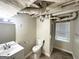 Finished bathroom features sink, toilet, and stall shower at 2361 Whites Mill Rd, Decatur, GA 30032
