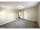 Neutral bedroom features gray carpet and two closets at 2361 Whites Mill Rd, Decatur, GA 30032