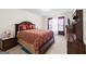 Comfortable bedroom with neutral carpeting, lovely natural light and elegant furniture at 3156 Oak Ridge Ln, Loganville, GA 30052