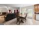 Cozy dining area adjacent to the living room and kitchen offers tiled floor at 3156 Oak Ridge Ln, Loganville, GA 30052
