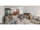 Inviting living room featuring patterned sofas, a decorative rug, and an open view to the dining room at 3156 Oak Ridge Ln, Loganville, GA 30052