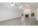 Bright living room with vaulted ceiling, fireplace and arched windows lets in natural light at 5082 Highland Hills Ct # 93, Stone Mountain, GA 30088