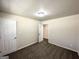 Neutral bedroom featuring neutral walls, carpet and a door to the bathroom at 3191 Gay Dr, Decatur, GA 30032