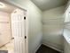 Walk in closet with metal shelving and carpeted floor at 3191 Gay Dr, Decatur, GA 30032