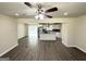 Open-concept living area with hardwood floors seamlessly connects to a modern kitchen with an island at 3191 Gay Dr, Decatur, GA 30032