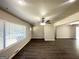 Spacious living area with hardwood floors and a large window allowing for natural light at 3191 Gay Dr, Decatur, GA 30032